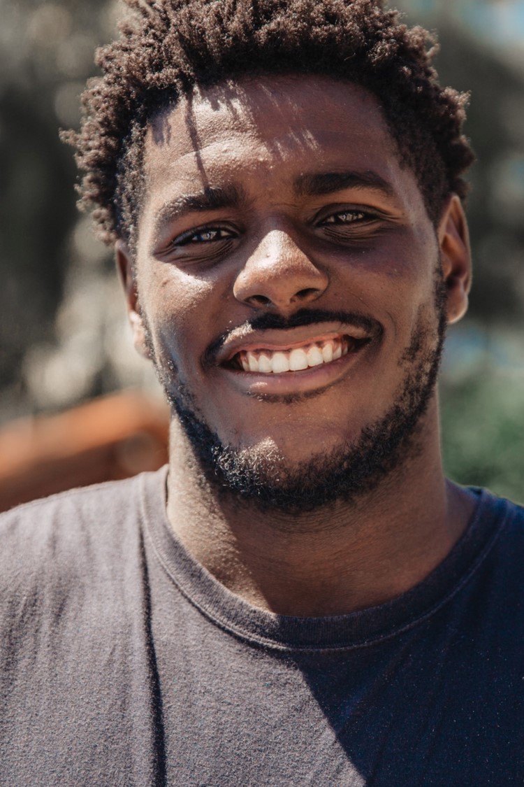 Man smiling sun on face